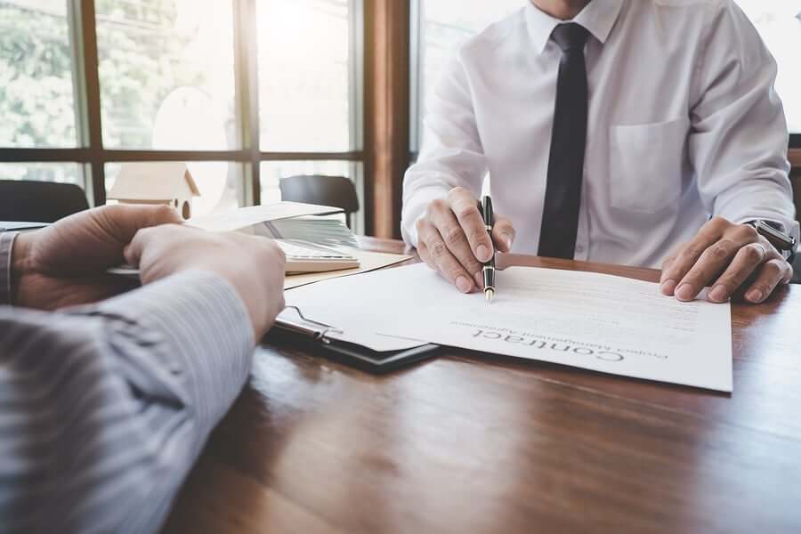 bigstock-Business-Signing-A-Contract-Bu-281589442